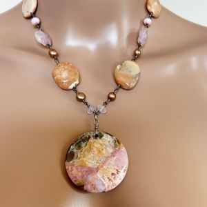 Necklace with pink and cream Rhodochrosite stones and  rose quartz accents.
